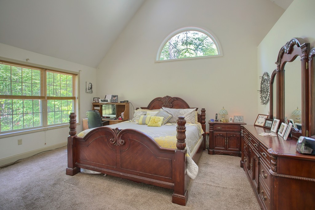 2270 South Athol Road Athol, MA 01331 - Photo 17 of 30 a bedroom with a bed and a tv on the dresser