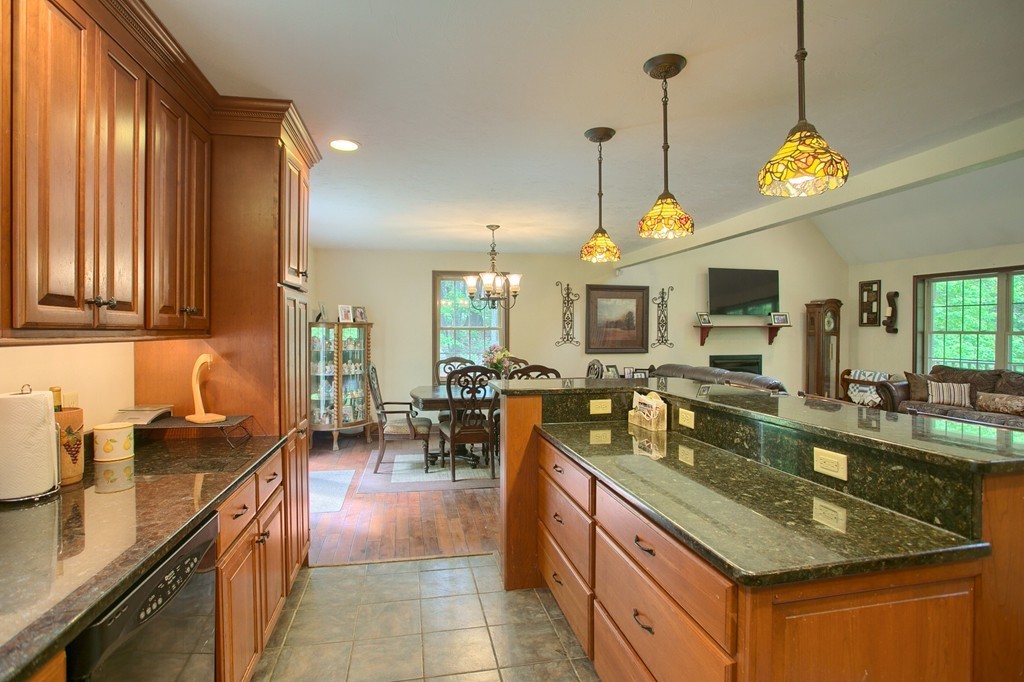 2270 South Athol Road Athol, MA 01331 - Photo 4 of 30 a kitchen with counter top space appliances and cabinets