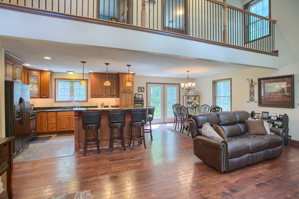 2270 South Athol Road Athol, MA 01331 - Photo 8 of 30 a living room with furniture kitchen and a wooden floor
