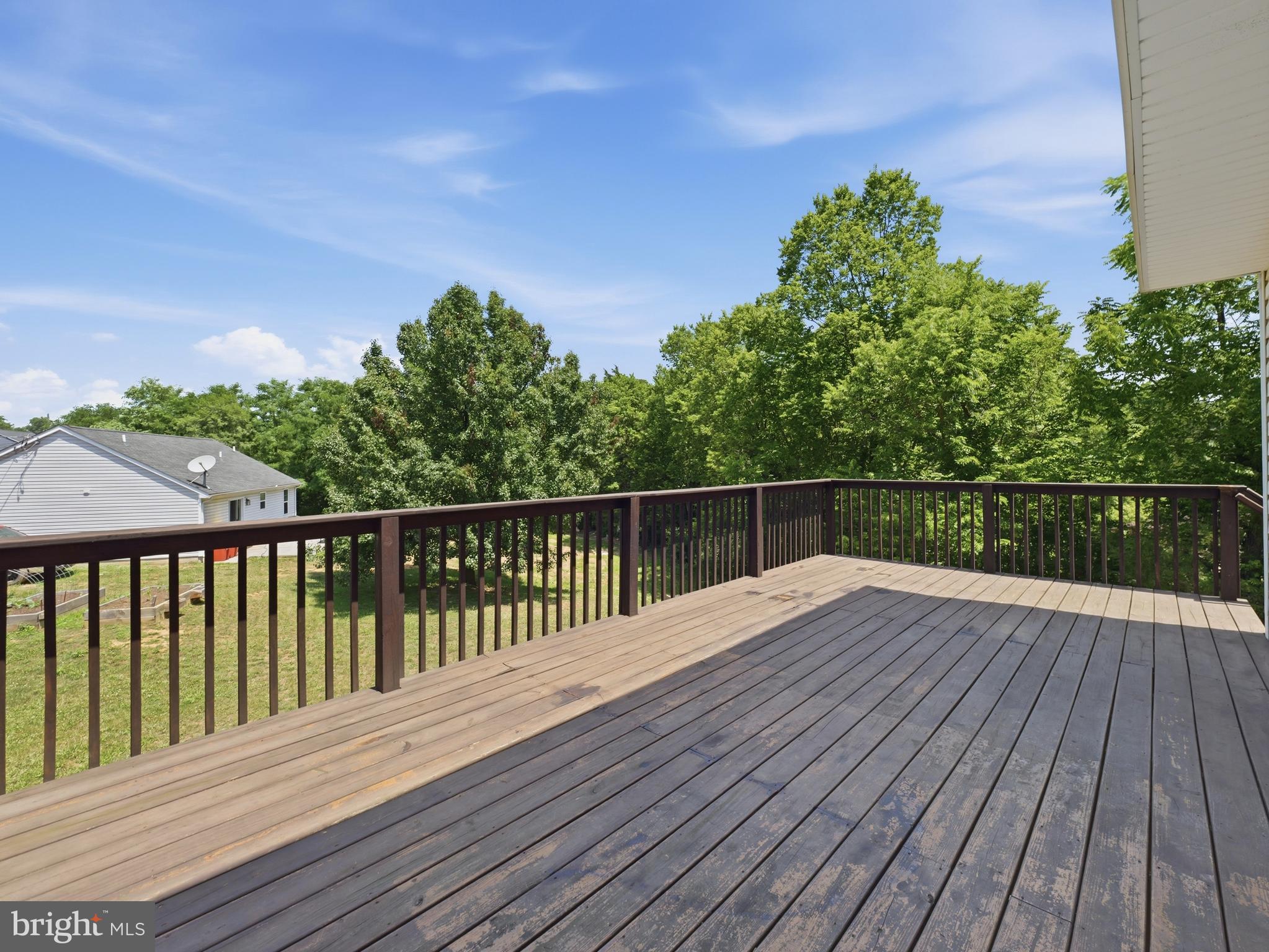 106 Washington Street Inwood, WV 25428 - Photo 8 of 43 Deck overlooks Detached Homes