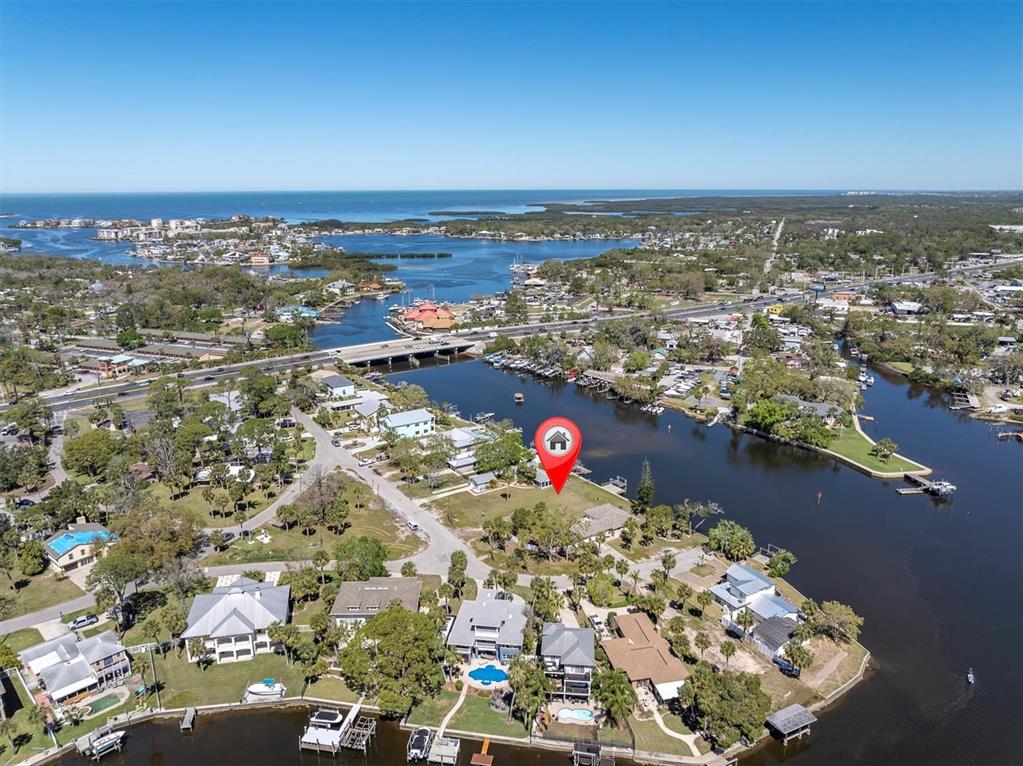 5433 Cotee River Drive New Port Richey, FL 34652 - Photo 15 of 18 an aerial view of a city