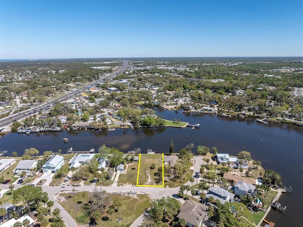 5433 Cotee River Drive New Port Richey, FL 34652 - Photo 16 of 18 an aerial view of a city