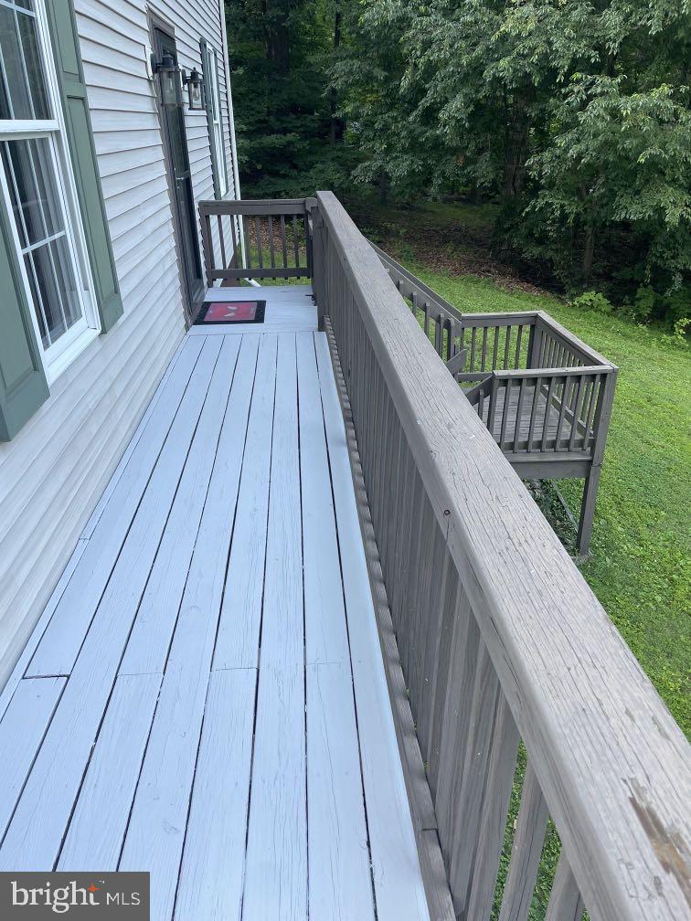 604 Rocky Ridge Road Spring Grove, PA 17362 - Photo 9 of 47 Serene deck overlooking lush greenery.