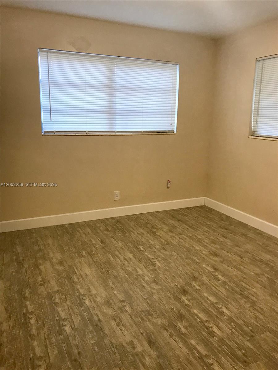 3700 Taft Street Hollywood, FL 33021 - Photo 7 of 10 a view of an empty room with a window