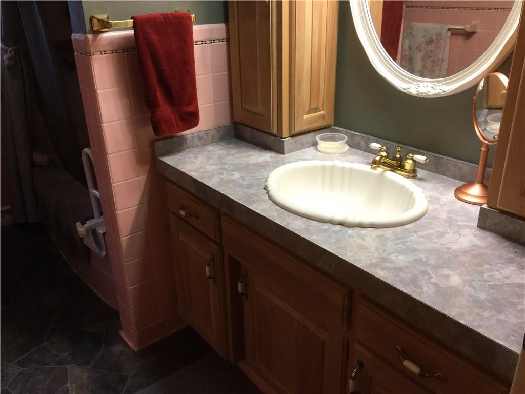 296 South Keel Ridge Road Hermitage, PA 16148 - Photo 12 of 25 MAIN BATH HAS NEWER FLOORING AND IS SEMI-UPDATED.
