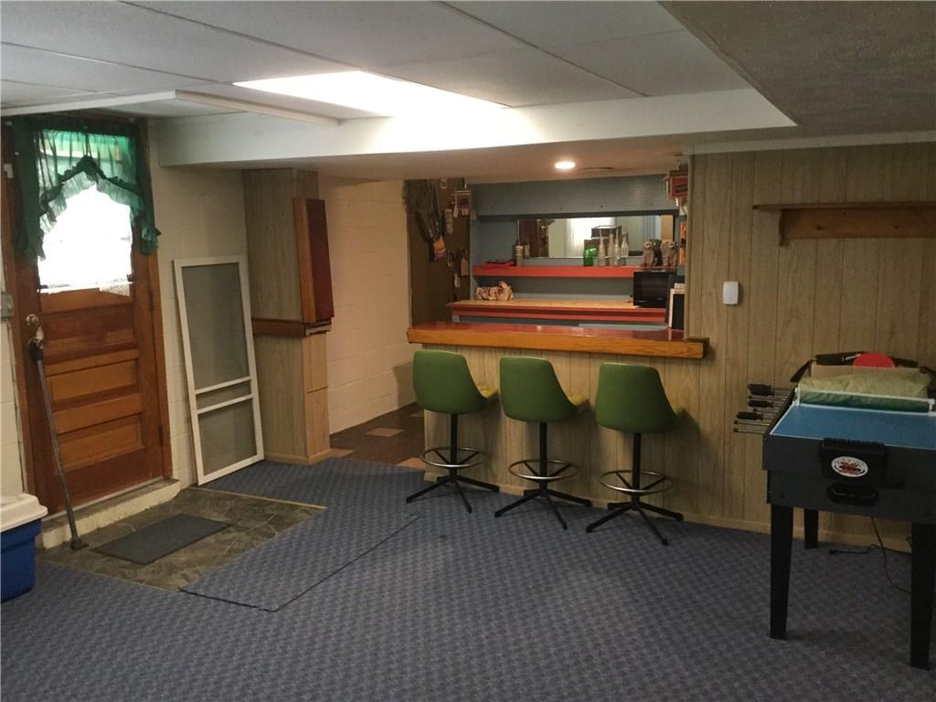 296 South Keel Ridge Road Hermitage, PA 16148 - Photo 21 of 25 BASEMENT FAMILY ROOM HAS A WET BAR