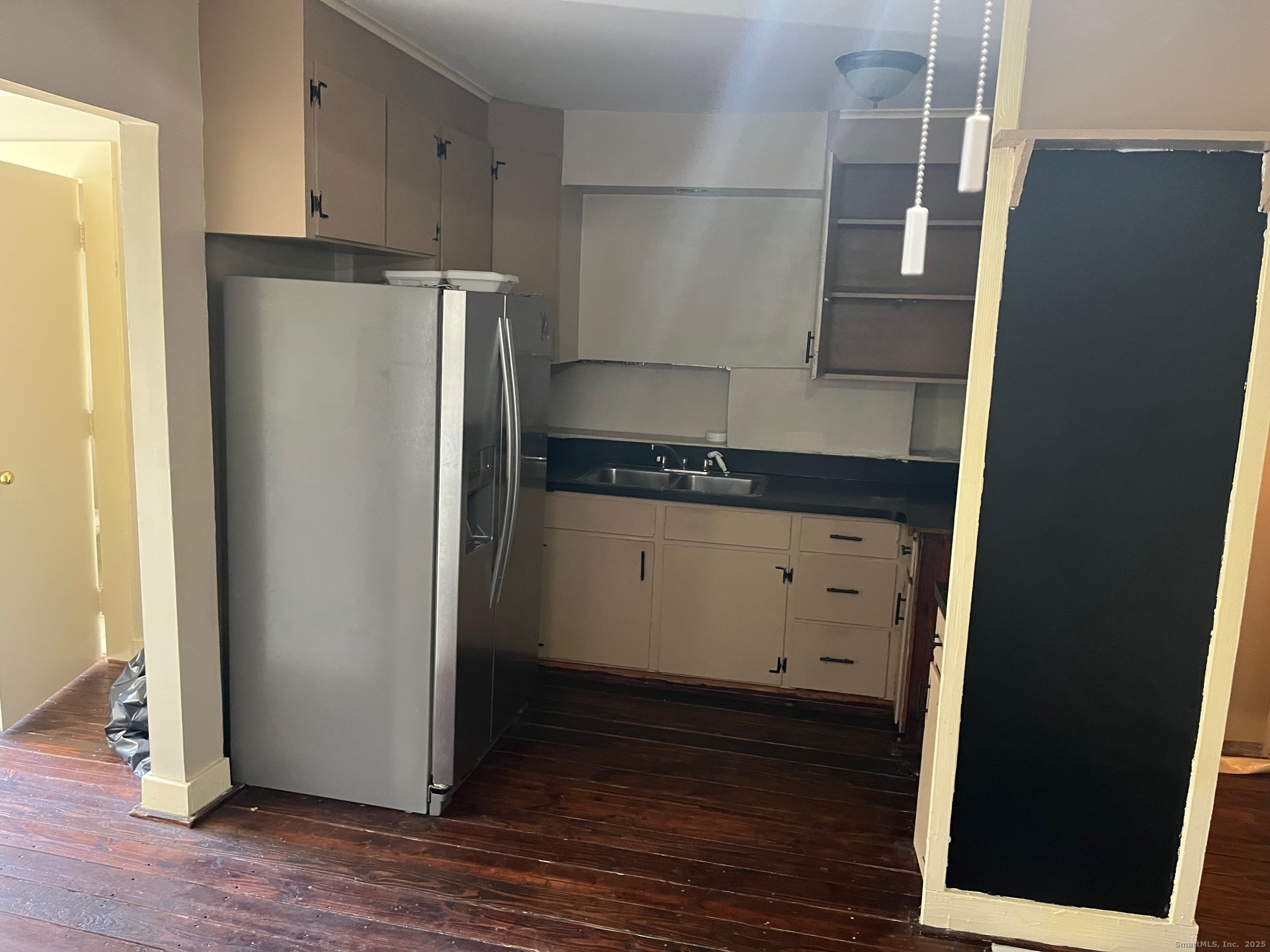 43 North Pearl Street Meriden, CT 06450 - Photo 12 of 20 a kitchen with a refrigerator and a stove