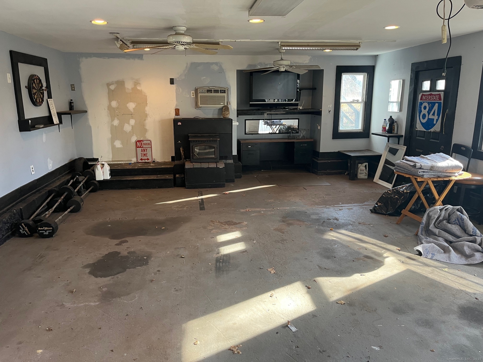 43 North Pearl Street Meriden, CT 06450 - Photo 17 of 20 a living room with stainless steel appliances furniture a flat screen tv and a sink