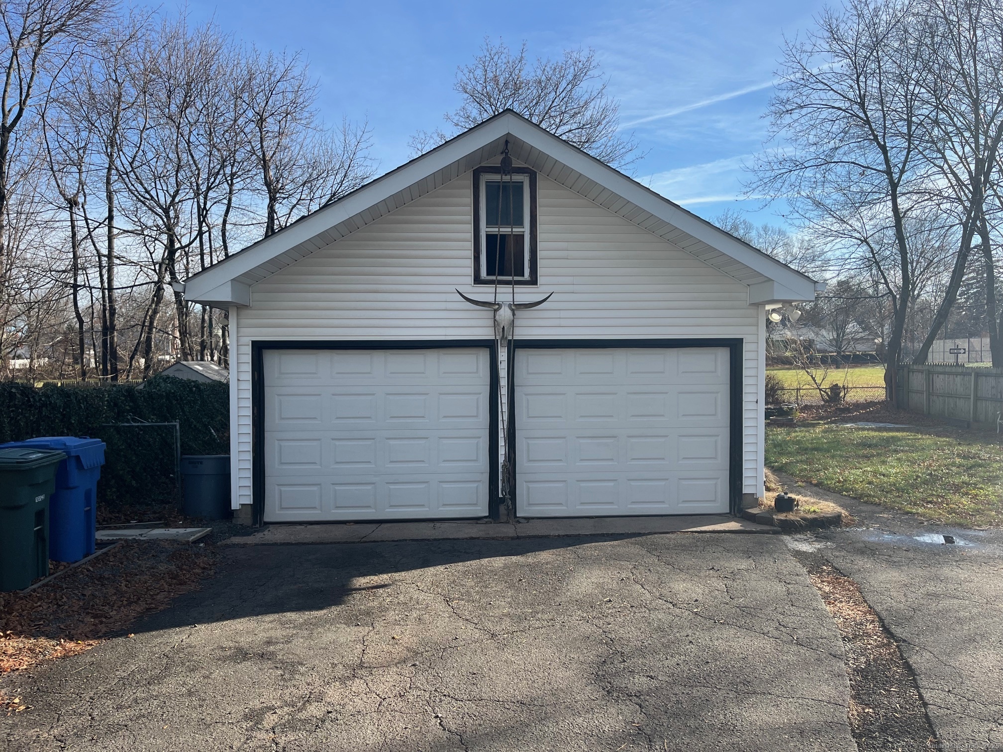 43 North Pearl Street Meriden, CT 06450 - Photo 18 of 20 a front view of a house with a yard and garage