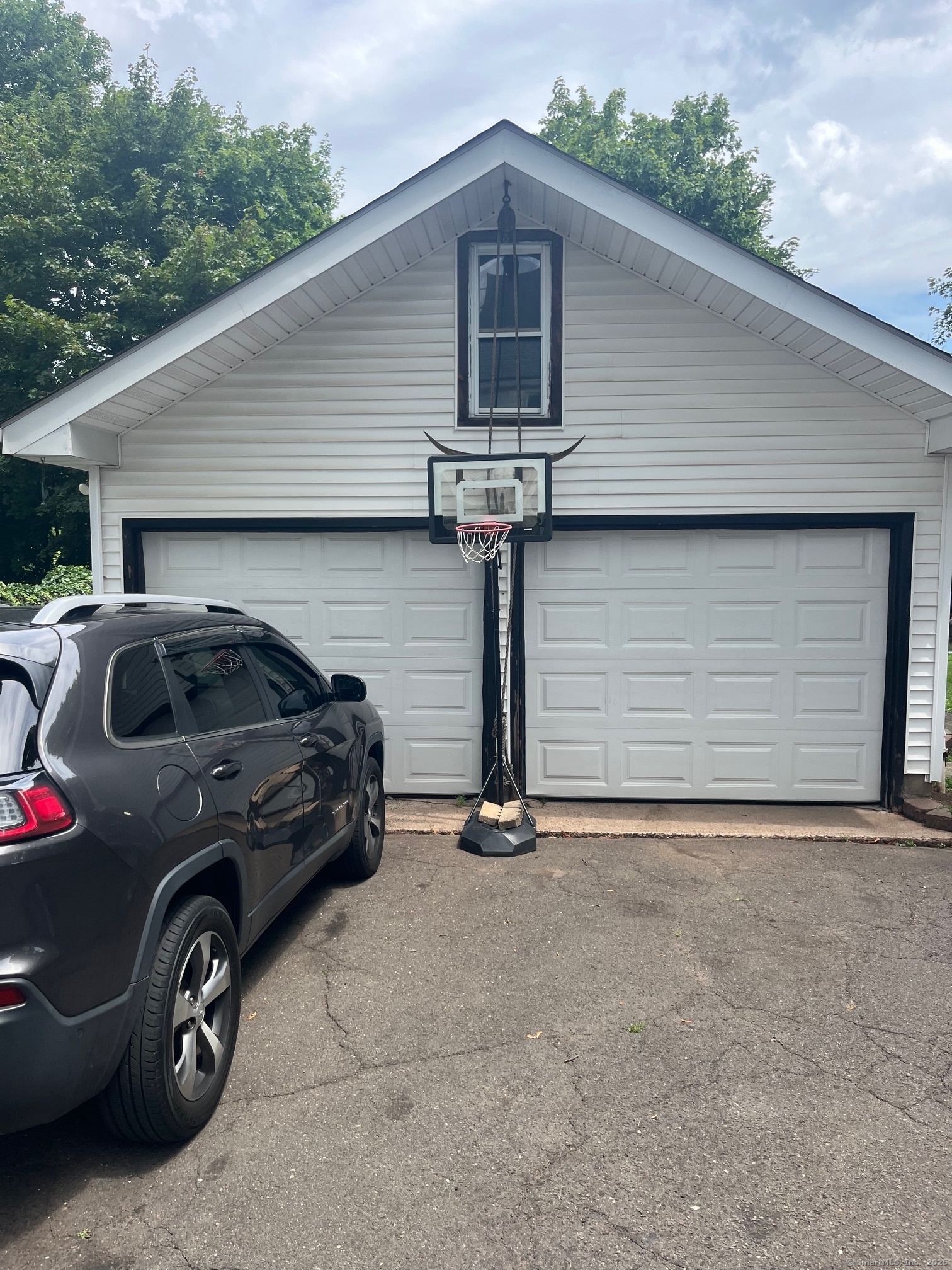 43 North Pearl Street Meriden, CT 06450 - Photo 2 of 20 a car parked in front of a house