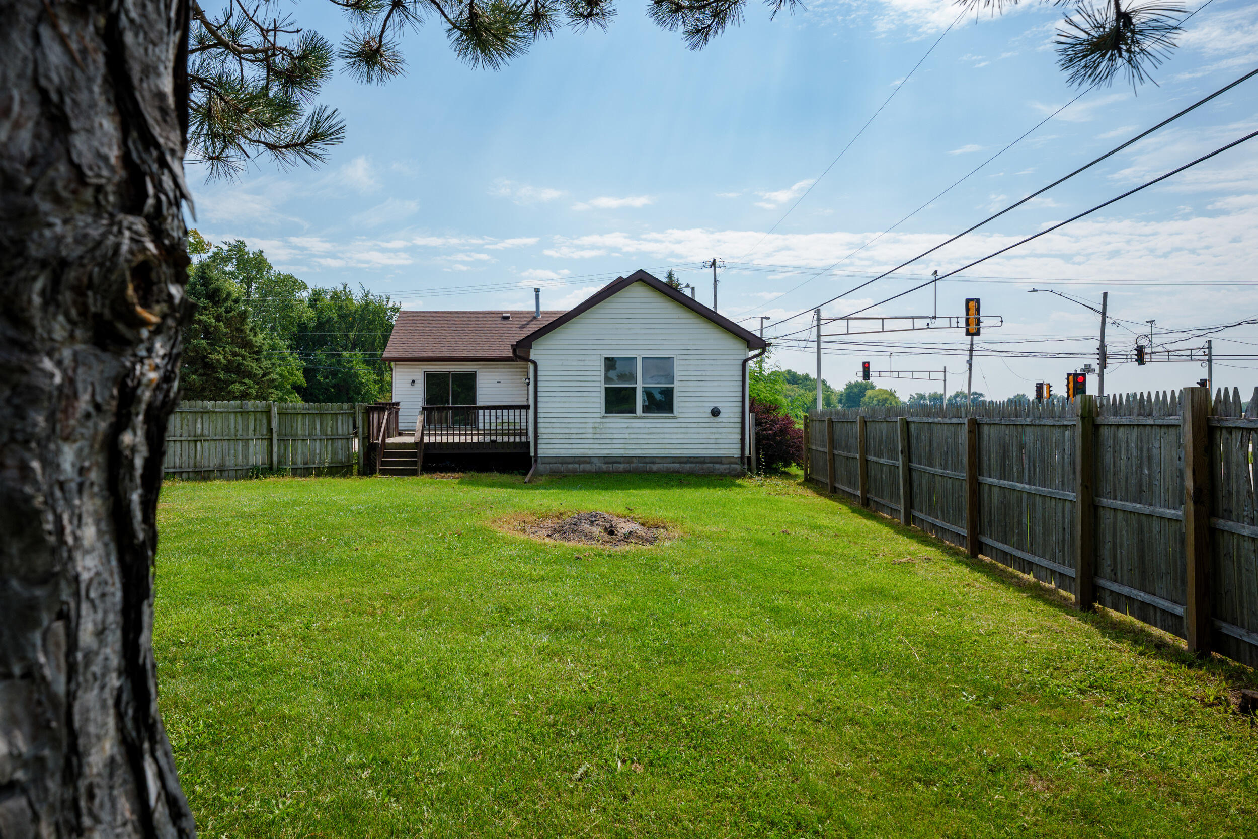 12130 Spring Street Mount Pleasant, WI 53177 - Photo 29 of 45 Fenced yard