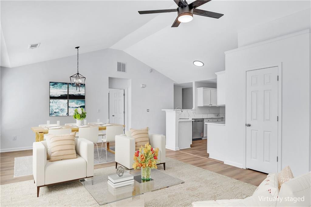 2540 Willow Grove Road, Unit 15 Acworth, GA 30101 - Photo 14 of 35 a living room with furniture and a kitchen area