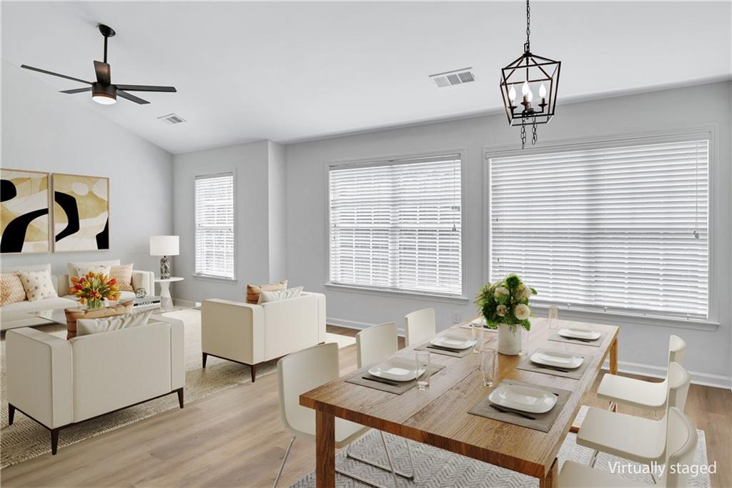 2540 Willow Grove Road, Unit 15 Acworth, GA 30101 - Photo 15 of 35 a view of a dining room with furniture window and wooden floor