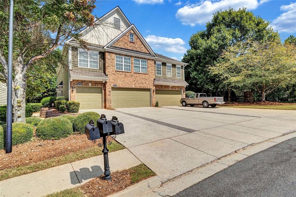 2540 Willow Grove Road, Unit 15 Acworth, GA 30101 - Photo 2 of 35 a front view of a house with garden