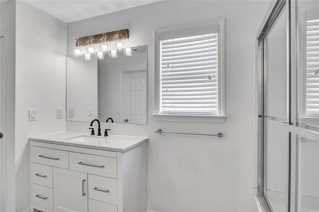 2540 Willow Grove Road, Unit 15 Acworth, GA 30101 - Photo 21 of 35 a bathroom with a sink and a mirror