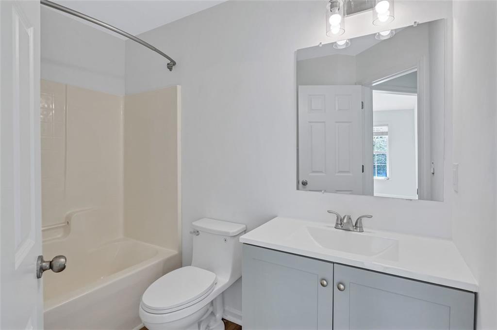 2540 Willow Grove Road, Unit 15 Acworth, GA 30101 - Photo 28 of 35 a bathroom with a sink toilet and shower