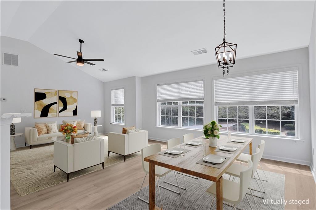 2540 Willow Grove Road, Unit 15 Acworth, GA 30101 - Photo 3 of 35 a living room with furniture a window and a chandelier