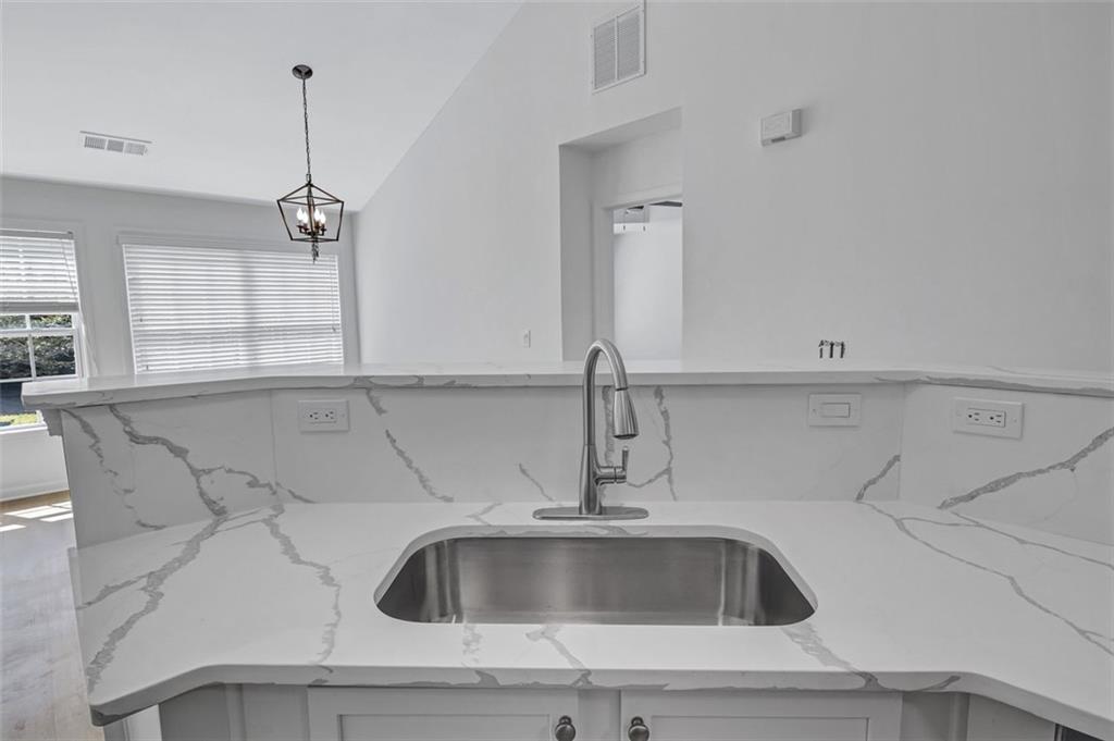 2540 Willow Grove Road, Unit 15 Acworth, GA 30101 - Photo 10 of 35 a kitchen with a sink and cabinets