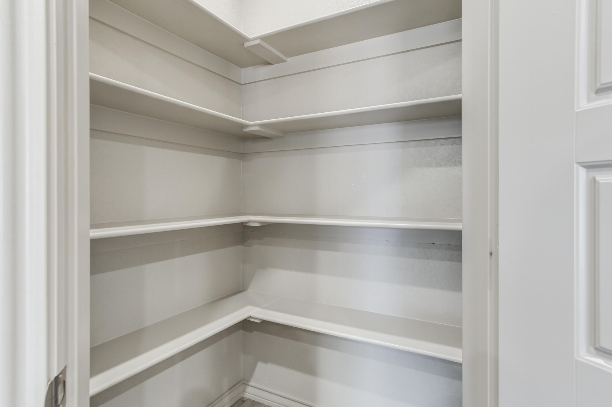 7614 62nd Street Lubbock, TX 79407 - Photo 34 of 54 a empty closet with white paint