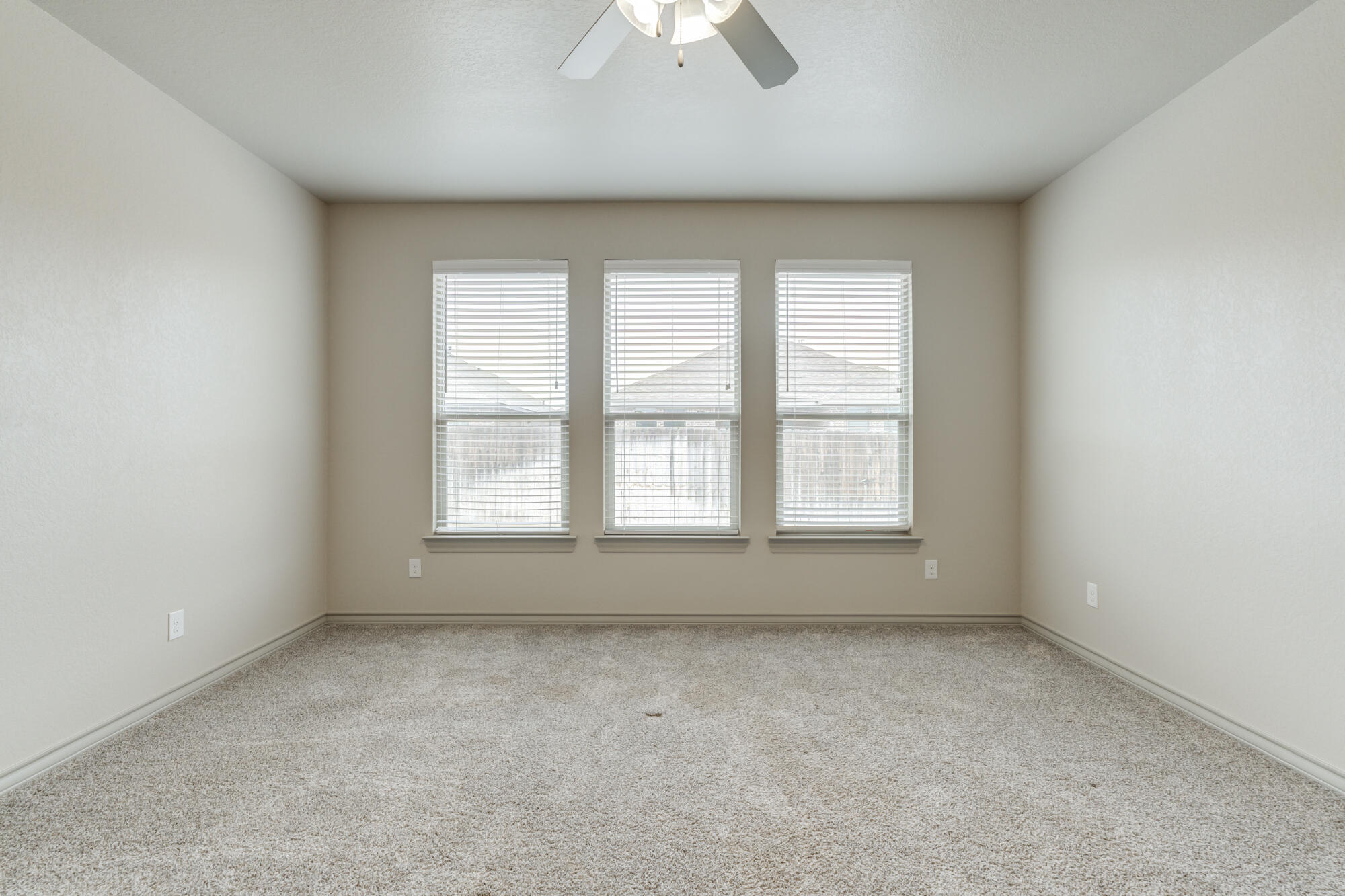 7614 62nd Street Lubbock, TX 79407 - Photo 35 of 54 an empty room with a window