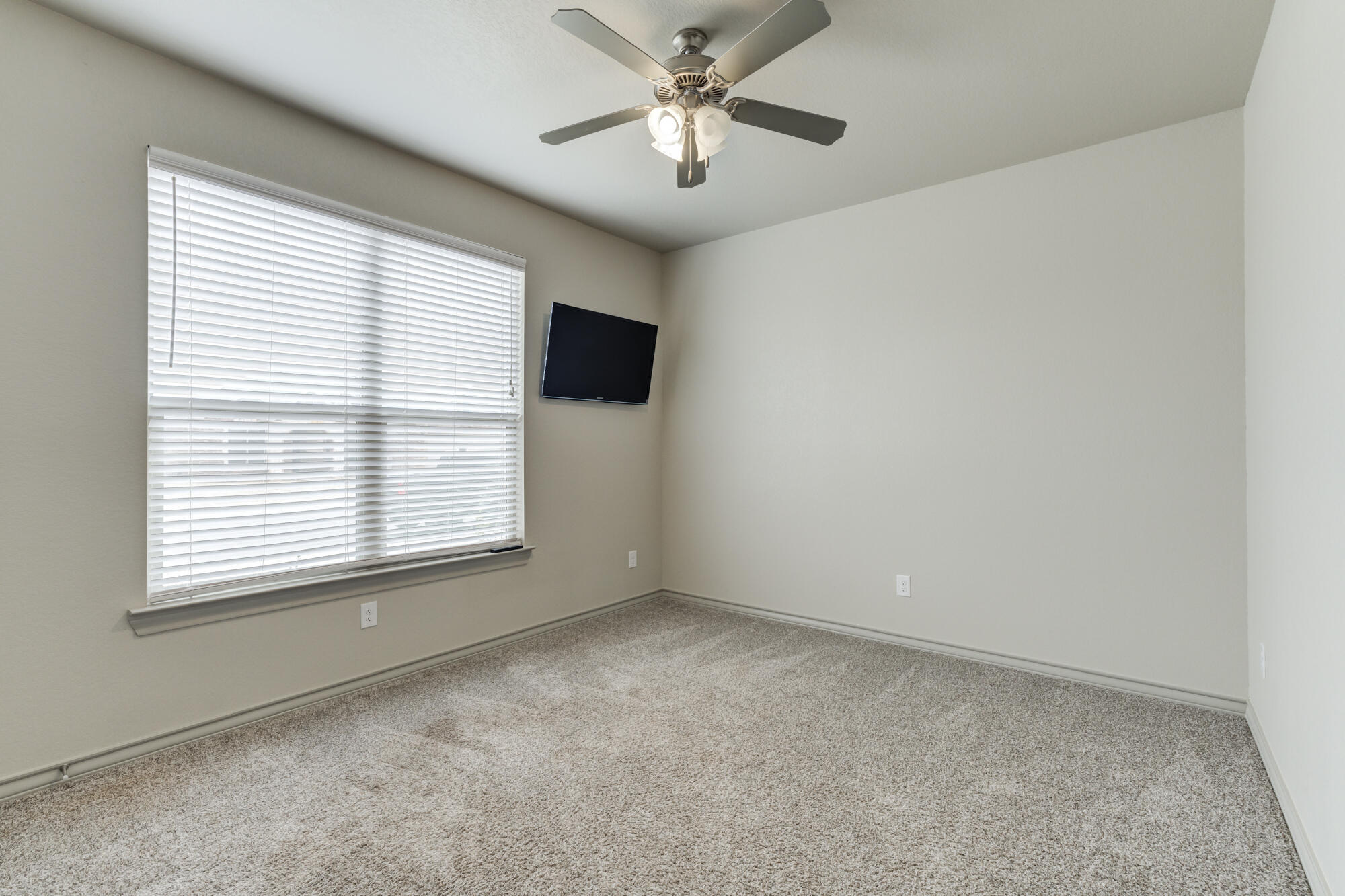 7614 62nd Street Lubbock, TX 79407 - Photo 41 of 54 a view of an empty room with a window