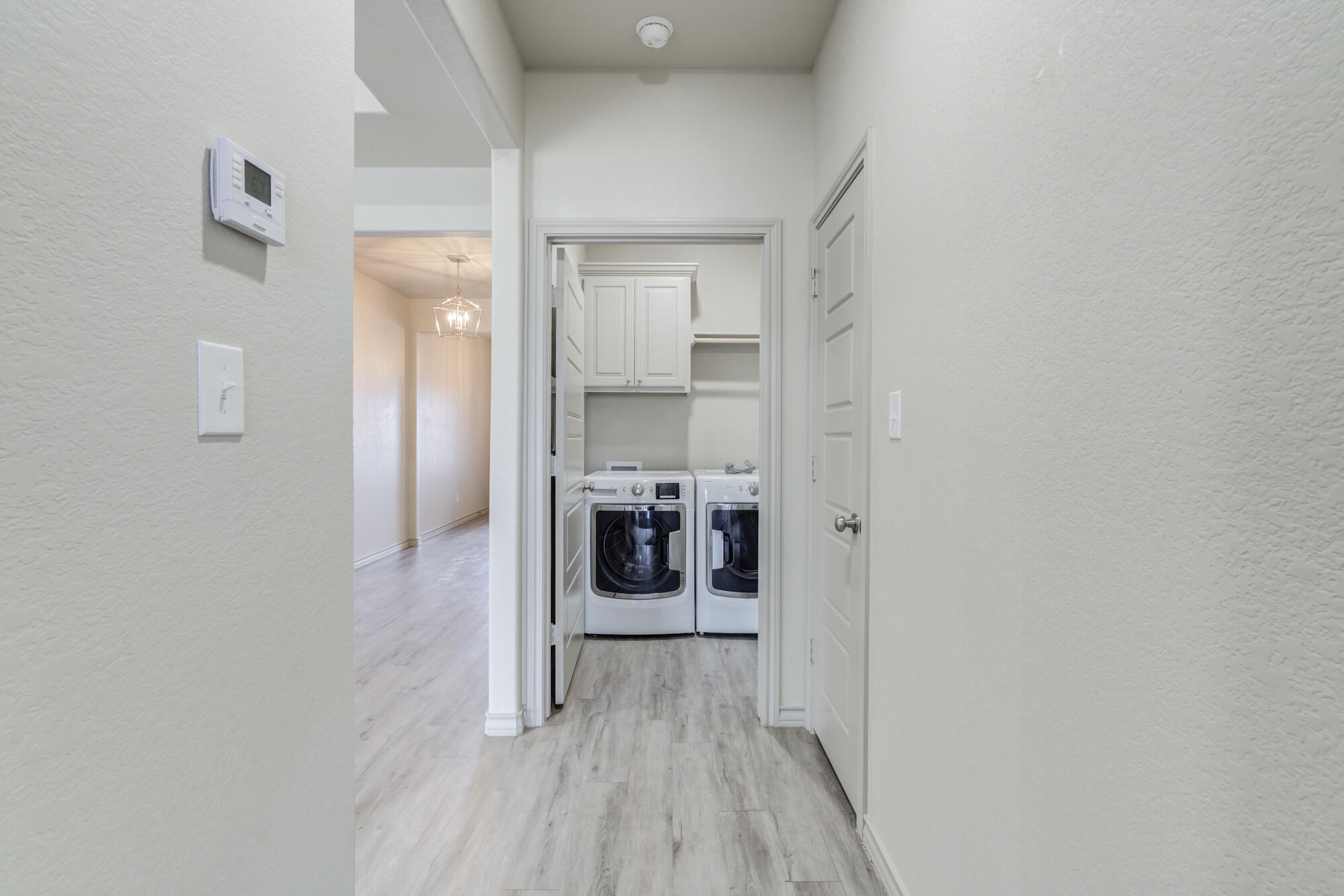 7614 62nd Street Lubbock, TX 79407 - Photo 47 of 54 7614-62nd-St_Lubbock-TX_23_Laundry-Room