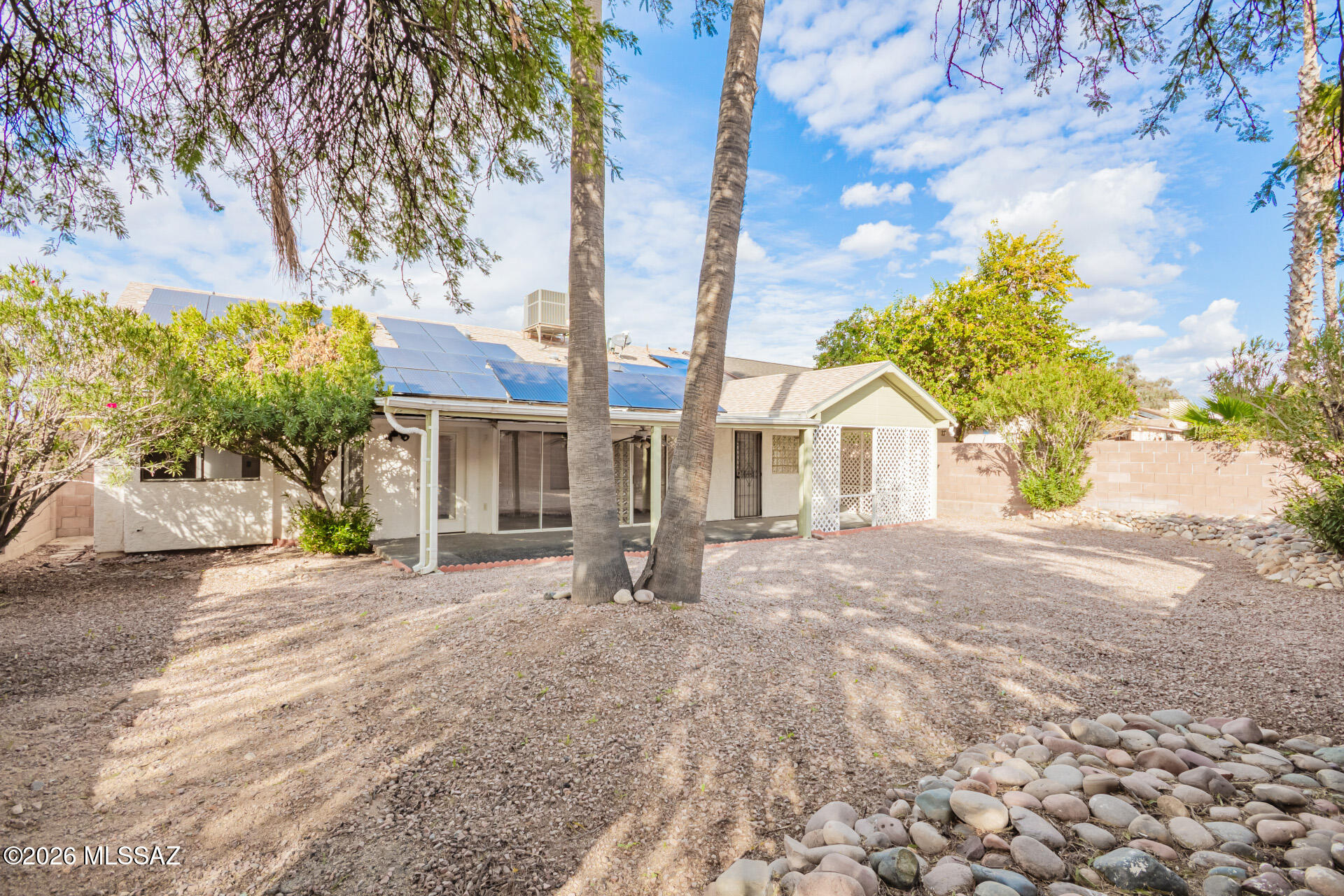 5331 West Eaglestone Loop Tucson, AZ 85742 - Photo 35 of 35 a view of a house with a yard and tree s