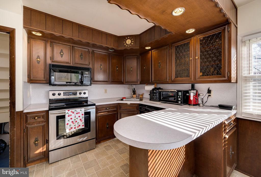 504 Harding Avenue Reading, PA 19607 - Photo 17 of 45 a kitchen with a sink appliances and cabinets