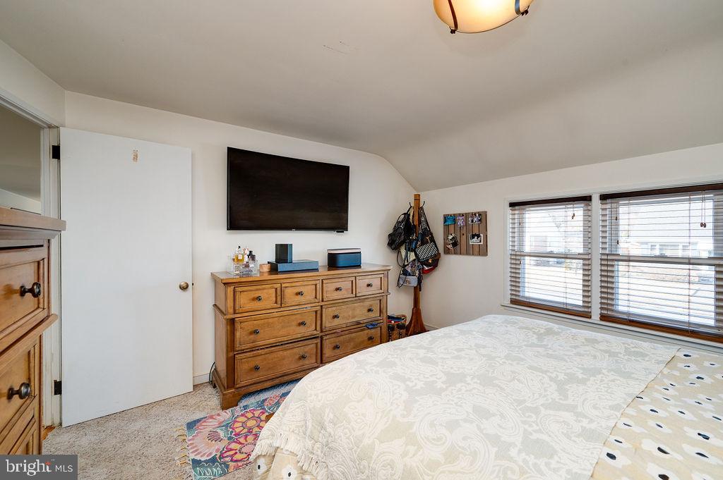 504 Harding Avenue Reading, PA 19607 - Photo 24 of 45 a bedroom with a bed and a flat screen tv