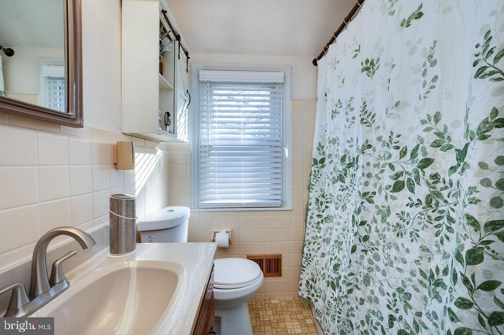 504 Harding Avenue Reading, PA 19607 - Photo 26 of 45 a bathroom with a sink and a toilet