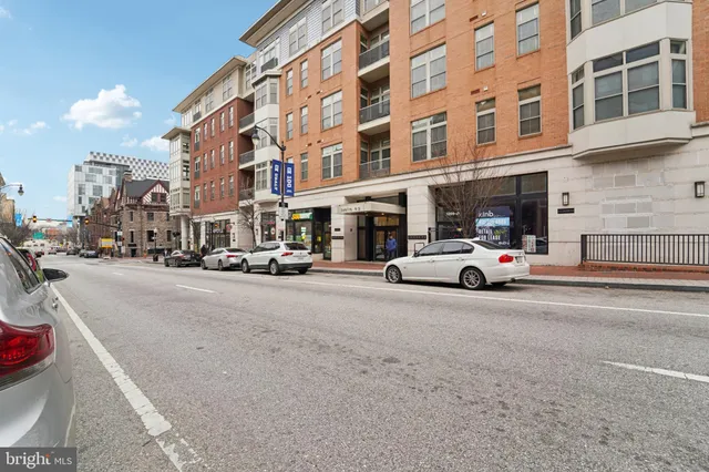 a view of a street with cars