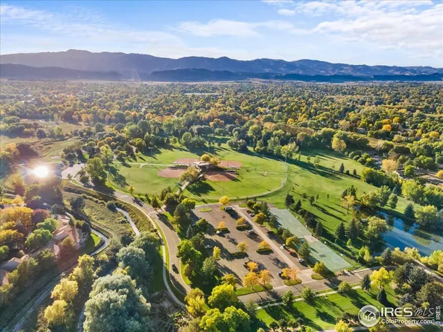a view of a city with mountains in the background
