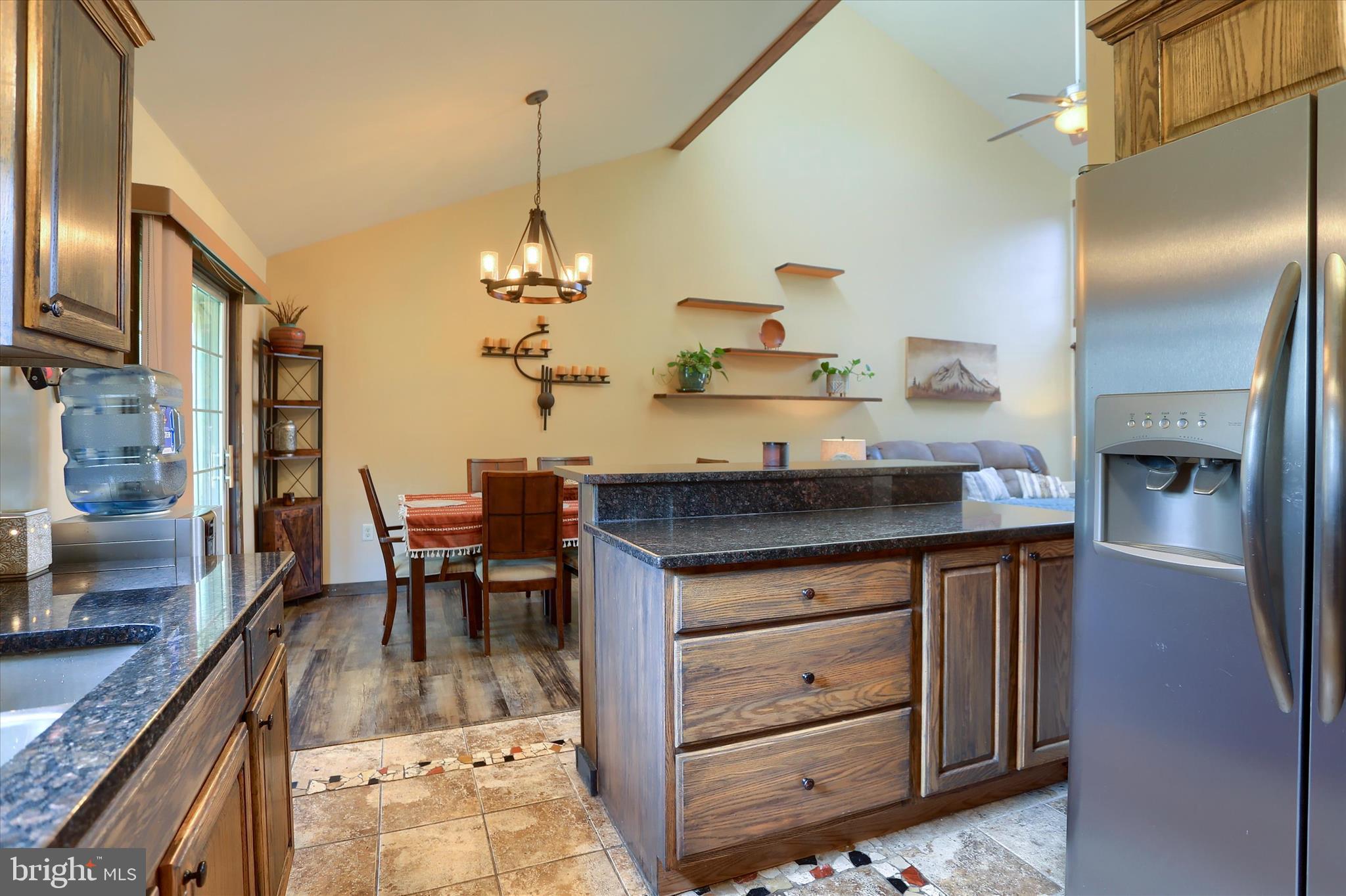 12 Edgewater Drive Middletown, PA 17057 - Photo 13 of 39 a kitchen with a table chairs and refrigerator