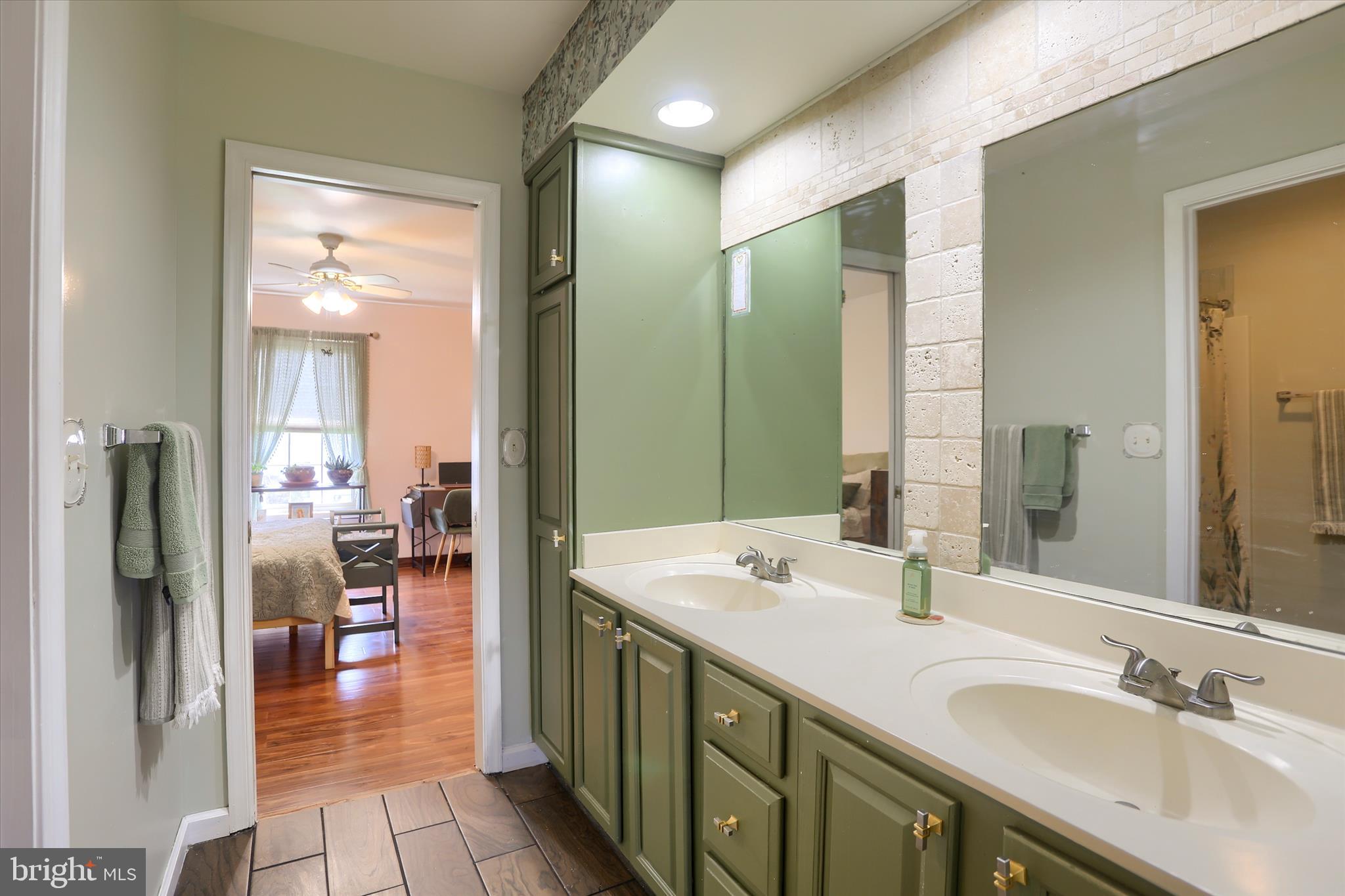 12 Edgewater Drive Middletown, PA 17057 - Photo 28 of 39 a bathroom with a double vanity sink and a mirror