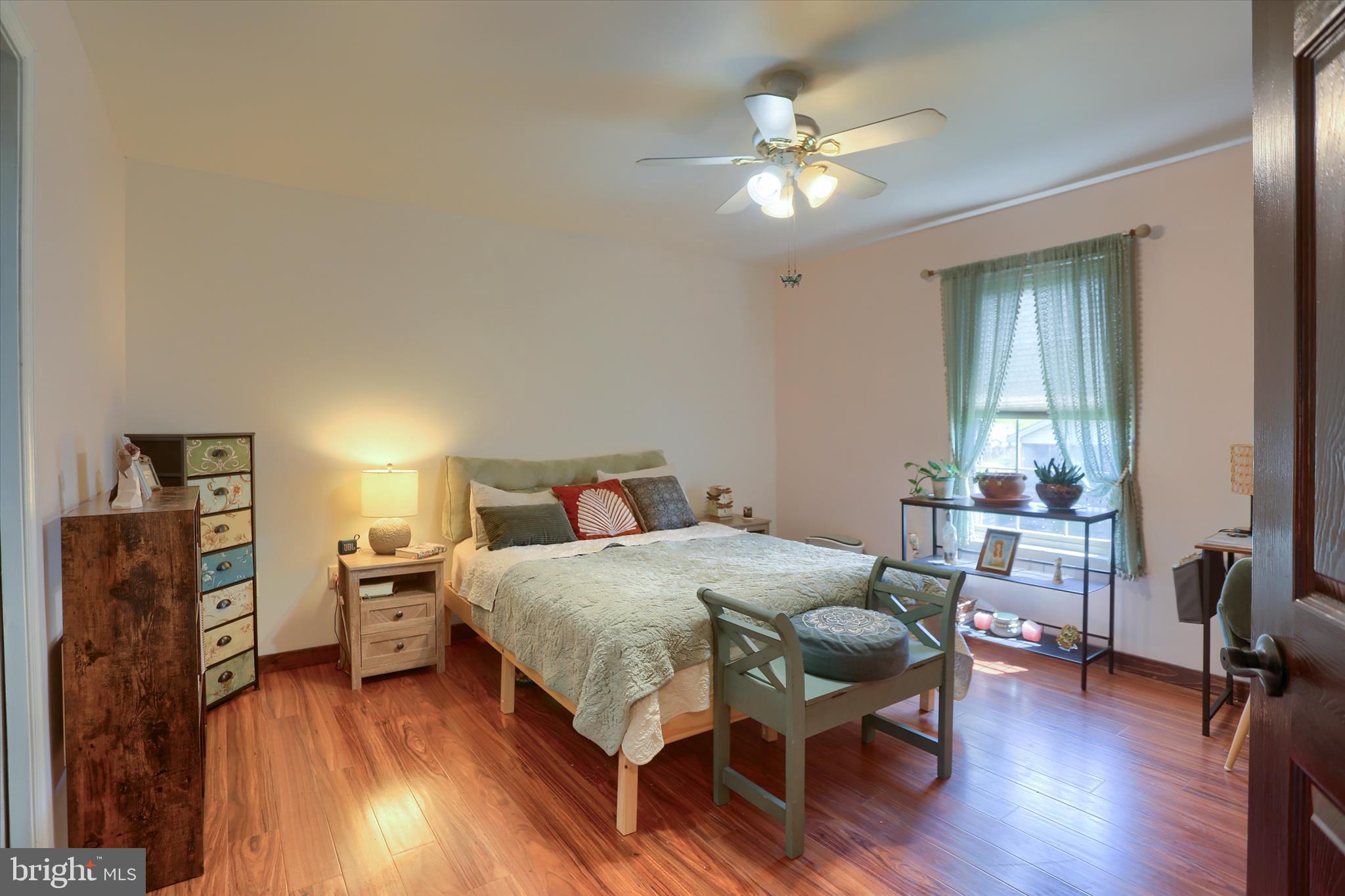 12 Edgewater Drive Middletown, PA 17057 - Photo 31 of 39 a bedroom with a bed and a table in it