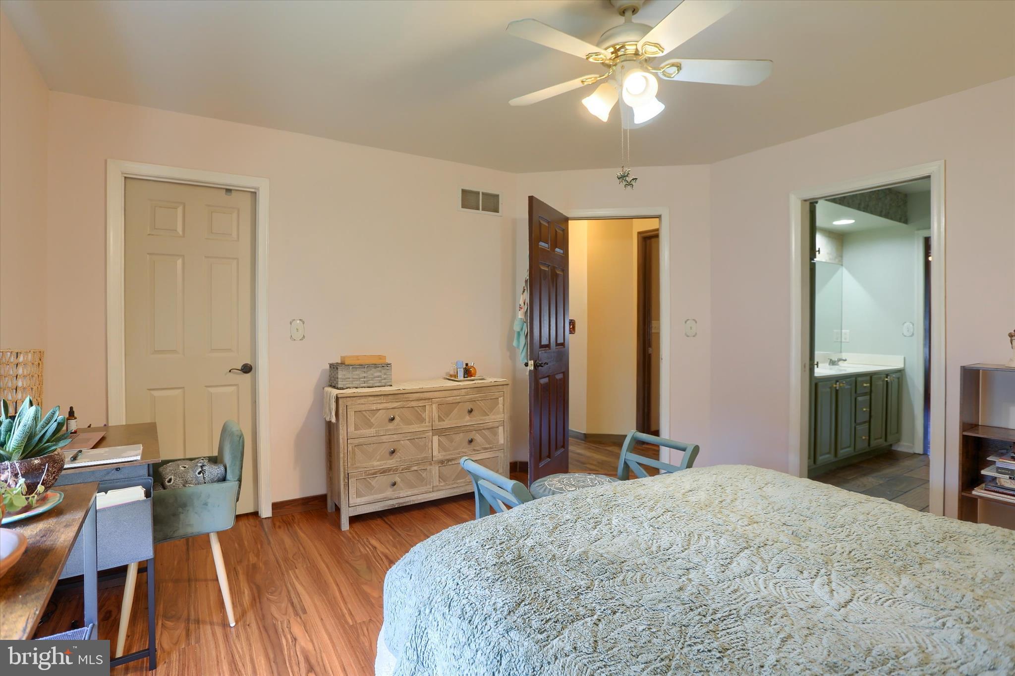 12 Edgewater Drive Middletown, PA 17057 - Photo 32 of 39 a bedroom with a bed and a chandelier