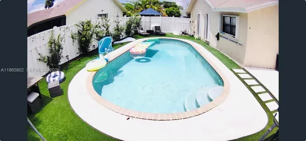 a view of backyard of a house