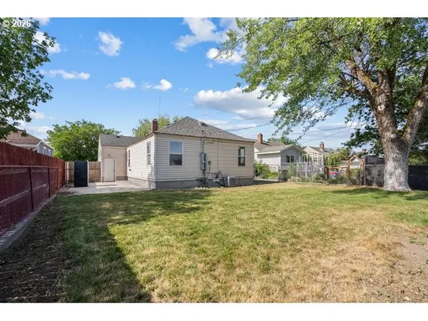 a bathroom with a sink and a yard