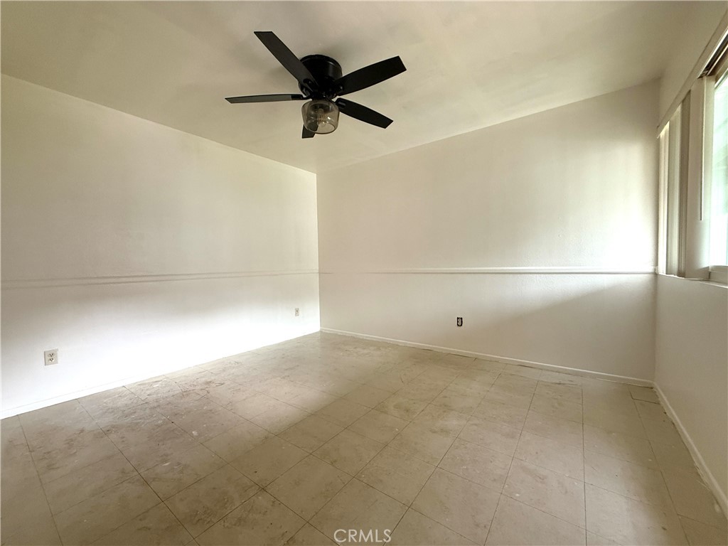 860 Cinnamon Lane, Unit 55 Duarte, CA 91010 - Photo 8 of 13 an empty room with a empty space and windows