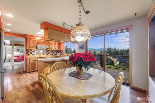 a view of a porch with wooden floor