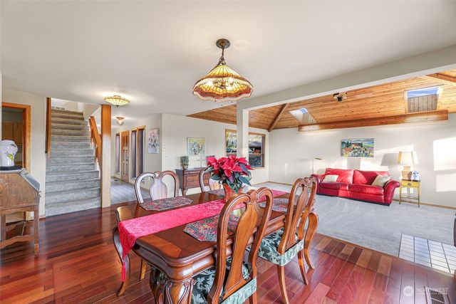 a view of a dining room with furniture