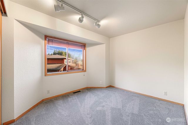 a view of a room with a large window