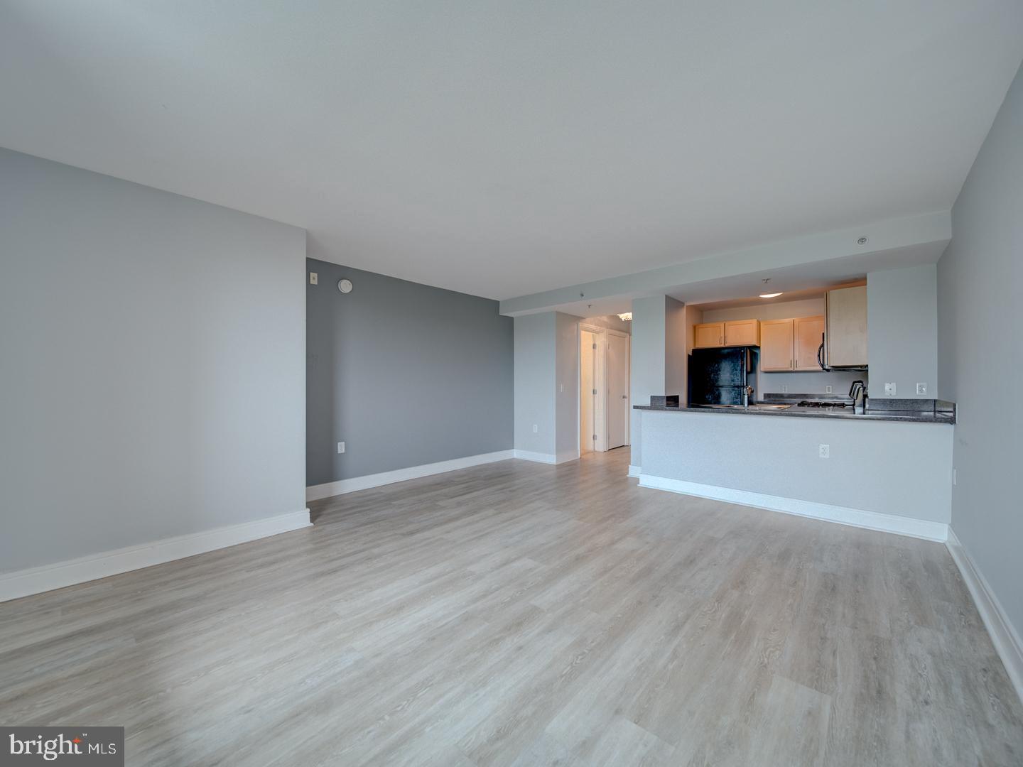 800 4th Street Southwest, Unit N703 Washington, DC 20024 - Photo 19 of 25 a view of a kitchen with a sink and a stove top oven