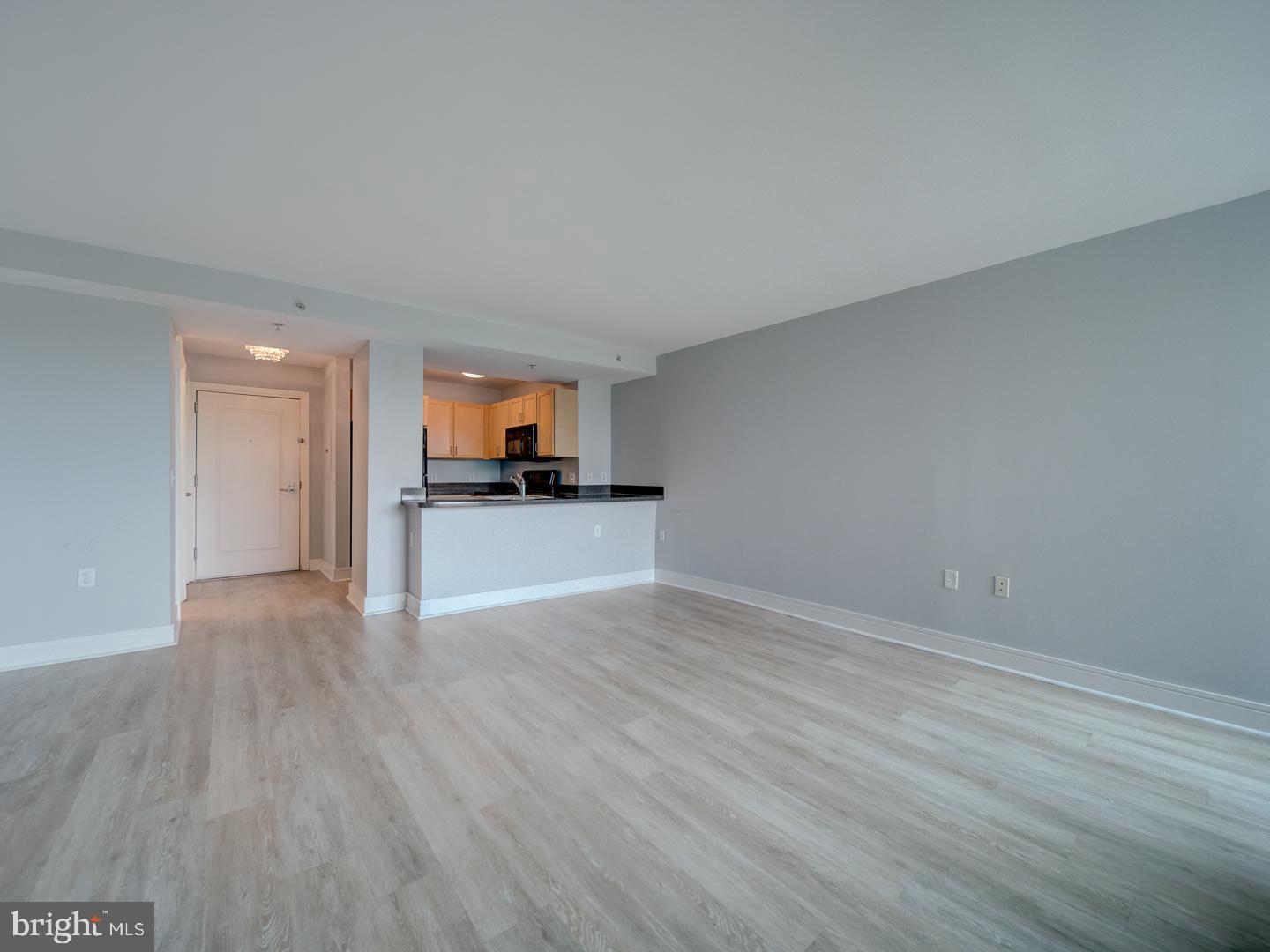 800 4th Street Southwest, Unit N703 Washington, DC 20024 - Photo 20 of 25 a view of a kitchen with a sink and a stove top oven