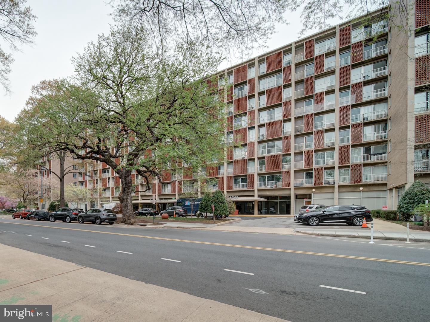 800 4th Street Southwest, Unit N703 Washington, DC 20024 - Photo 5 of 25 a buildings with car parked in front of it