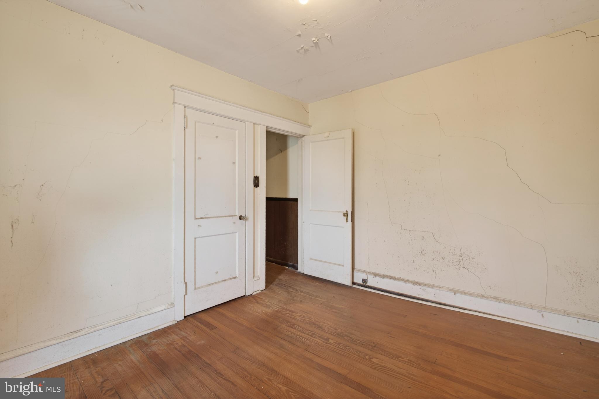 2583 Radcliffe Road Broomall, PA 19008 - Photo 8 of 12 an empty room with wooden floor