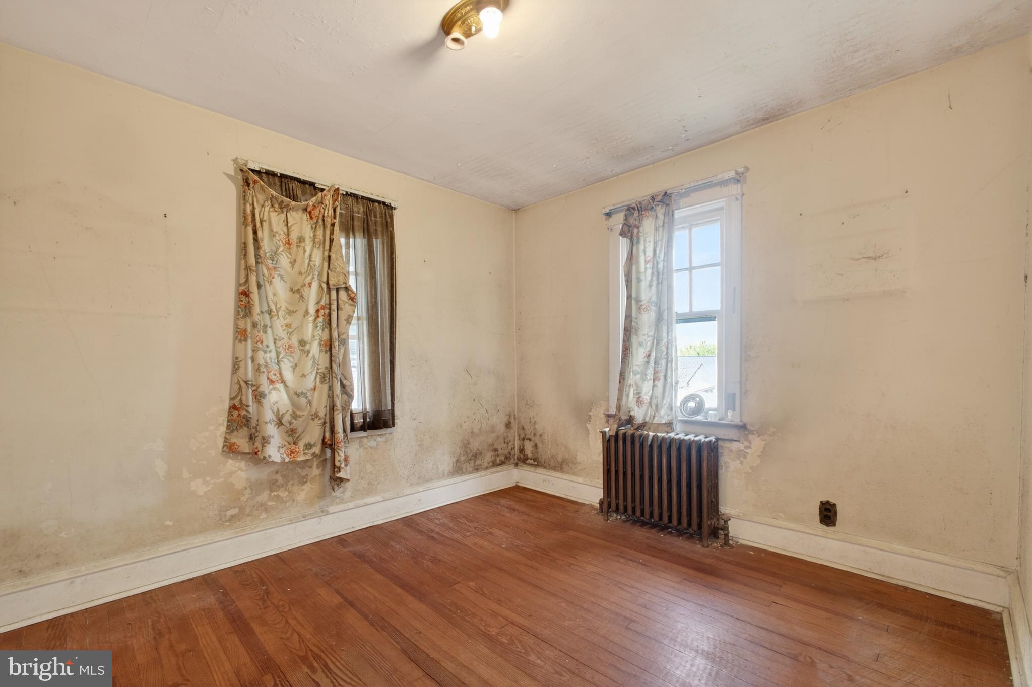 2583 Radcliffe Road Broomall, PA 19008 - Photo 9 of 12 an empty room with windows