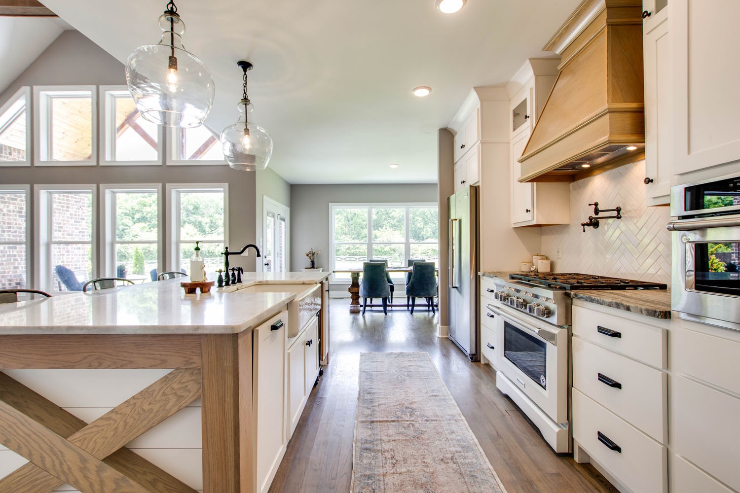 2502 Armstrong Valley Road Murfreesboro, TN 37128 - Photo 13 of 31 a large kitchen with stainless steel appliances granite countertop a lot of counter space and a wooden floors