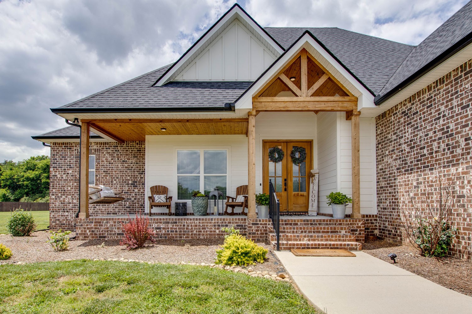 2502 Armstrong Valley Road Murfreesboro, TN 37128 - Photo 4 of 31 a front view of a house with garden