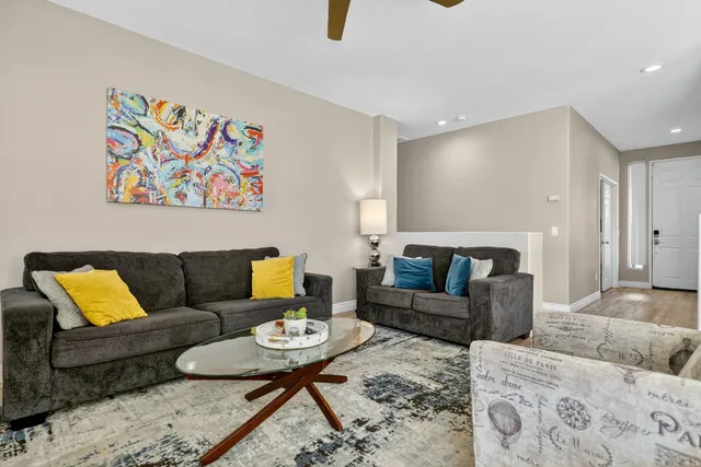 a living room with furniture and a couch